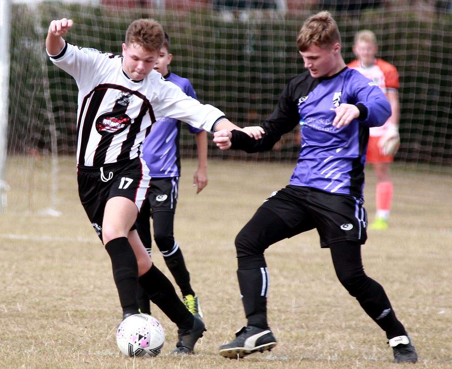Anchorians United (purple/black) do battle with Milton & Fulston United in the Under-16 League Cup Picture: Phil Lee