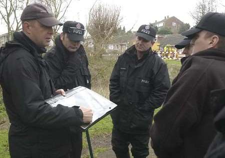 Sgt Mark Wigstone briefing other officers before a search of woods for Michael Mackrill earlier this week. Picture: CHRIS DAVEY
