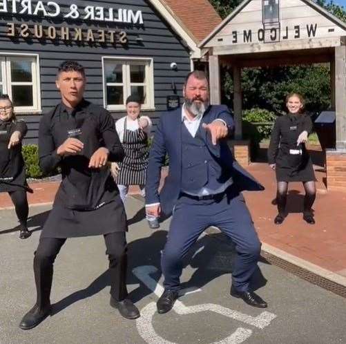 Workers at Miller and Carter Steakhouse in Herne Bay have gone viral with their hip-rolling video. Picture: Miller and Carter / TikTok