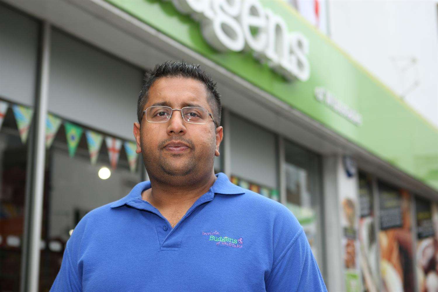 Budgens owner Binny Amin outside his store in Whitstable High Street