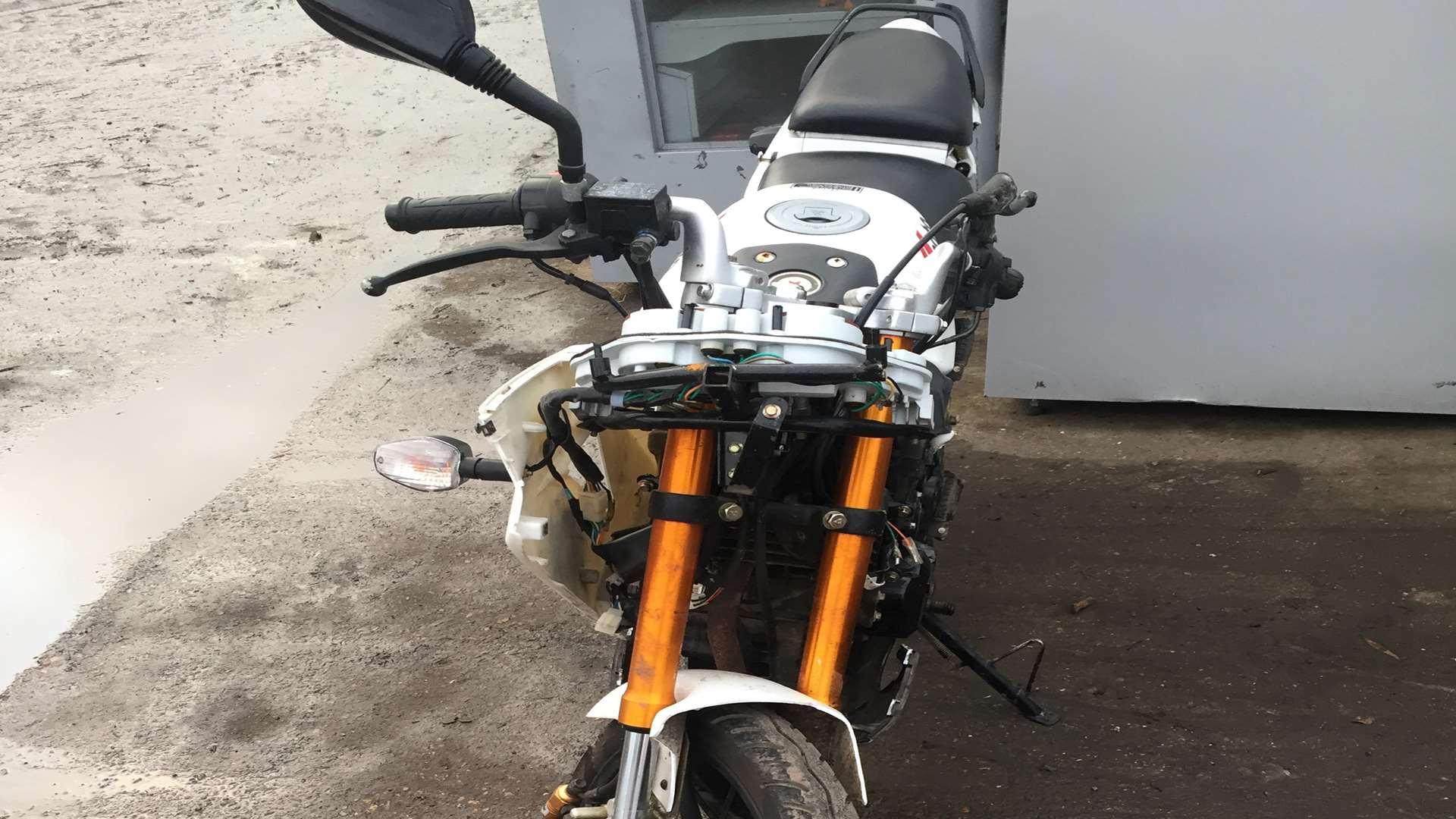 The damaged motorbike, which was hit by a car in Queenborough