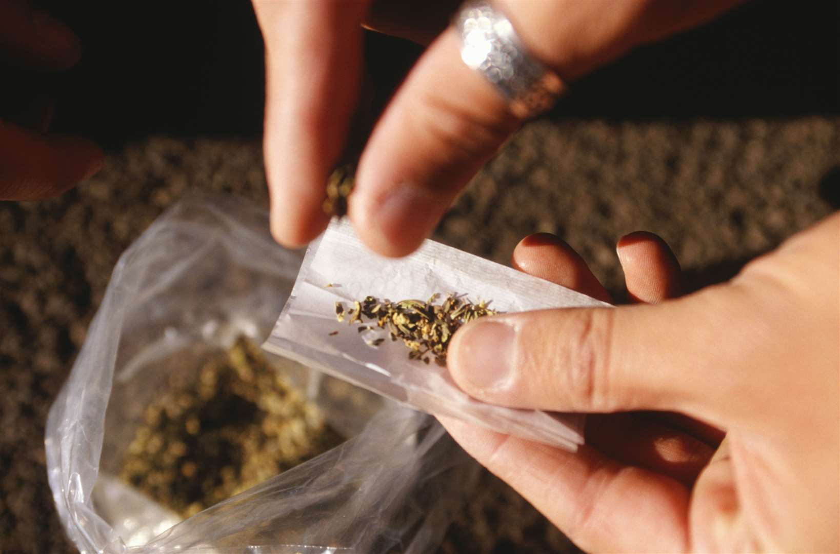 Someone rolling a joint, Stock picture: Thinkstock Library