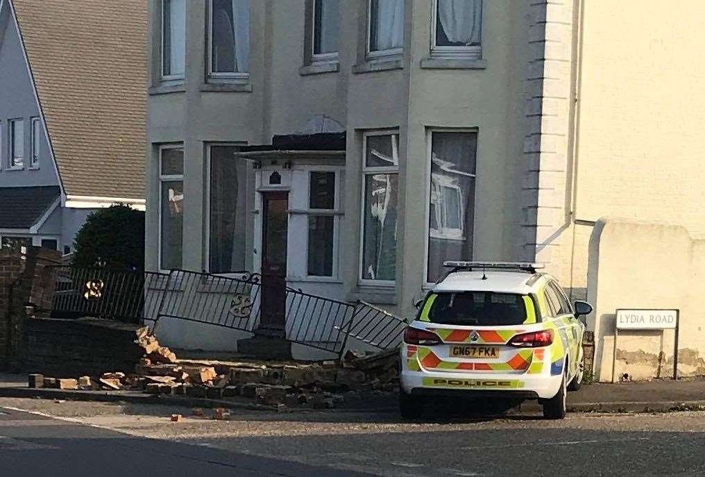 The police car has crashed into a wall outside a house in St Richards Road, Deal