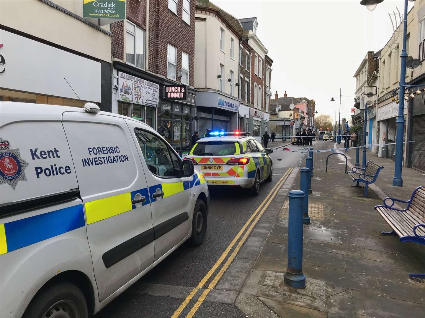 Forensics officers in Sheerness High Street after the attack