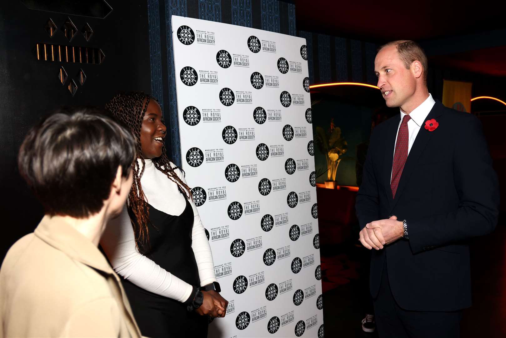 The Prince of Wales speaks with young film students at Film Africa (Tim P Whitty/PA)