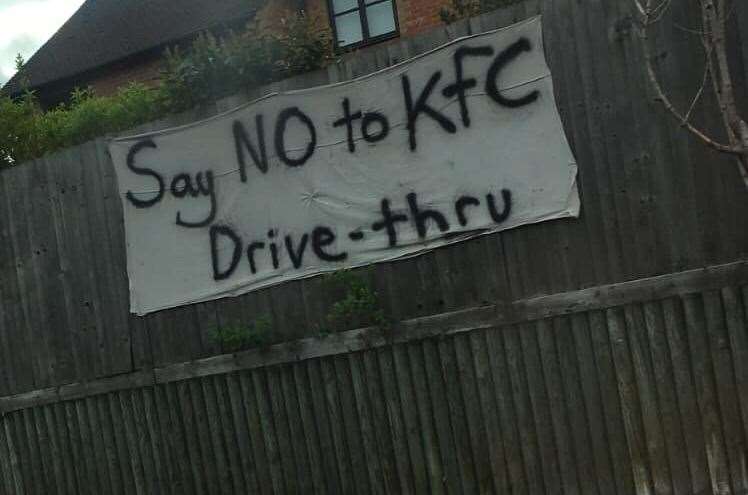 There are signs for and against a KFC in Snodland. Credit: Katie Rose