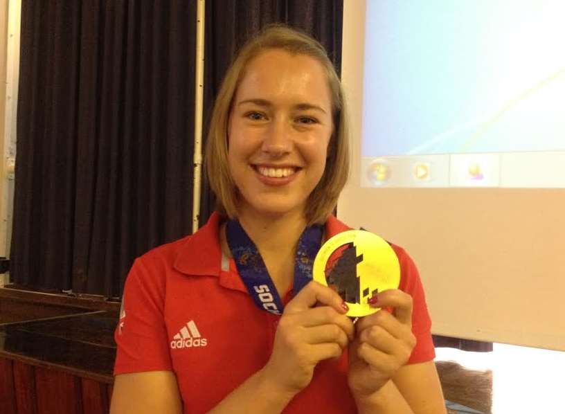 Lizzy Yarnold with her Olympic gold medal from Sochi 2014
