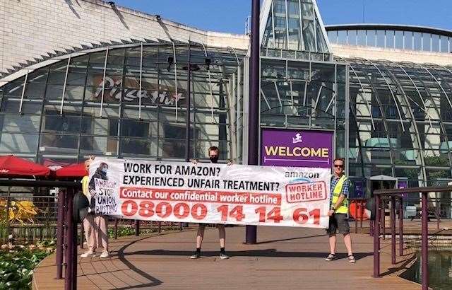 Protestors from Unite the Union stage a demonstration at Bluewater against Amazon over claims the retailer hiked prices during the pandemic. Picture: Unite