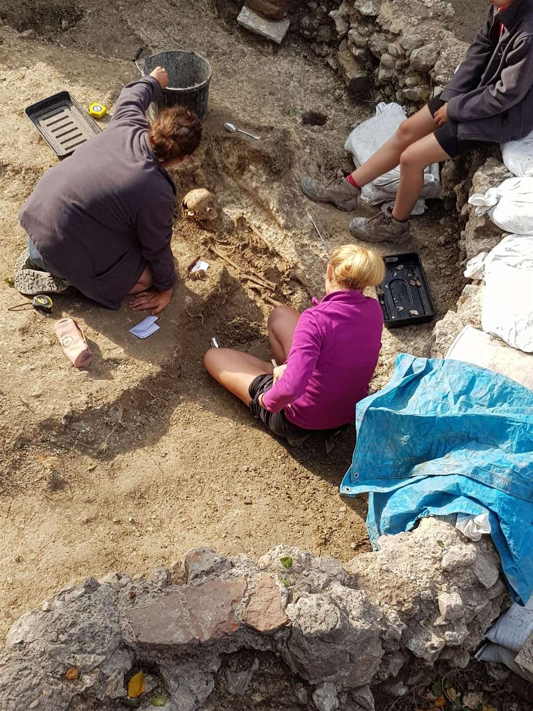 University of Reading PhD student Lisa Backhouse, and undergraduates Zoe Wiacek and Emily Gibson working on the remains. Photo: Pathways to the Past (14652558)