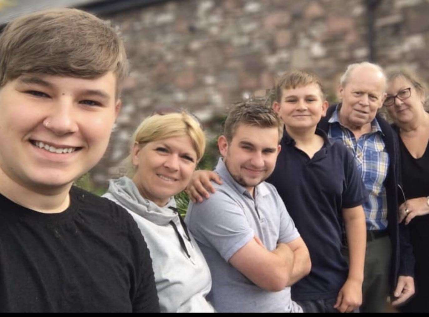 Glyn Moon, with his wife Susan, daughter Melanie and three grandsons Ryan, Jamie and Sam