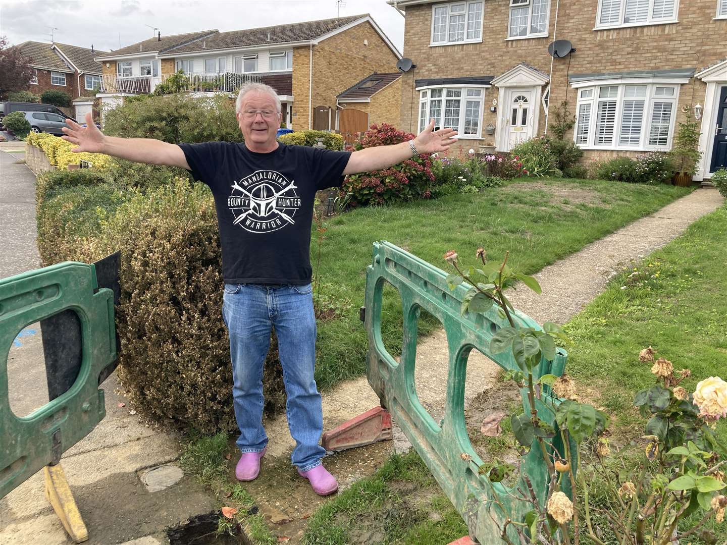 John MacGregor with the water leak outside his home in Clive Way, Sittingbourne