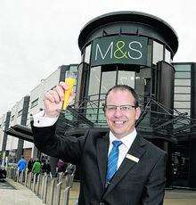 Store manager Alex Clarke celebrates the opening of a new floor at Westwood Cross M&S