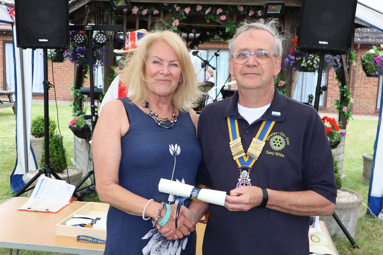 Julie Nicholls of Sheppey FM with president Gary White at Minster-on-Sea Rotary Club's Platinum Jubilee volunteer awards at the Abbey Hotel on Friday
