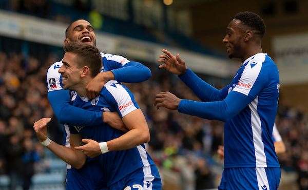 Olly Lee celebrates with Mikael Mandron and Brandon Hanlan as the Gills go 2-0 up Picture: Ady Kerry (23056209)