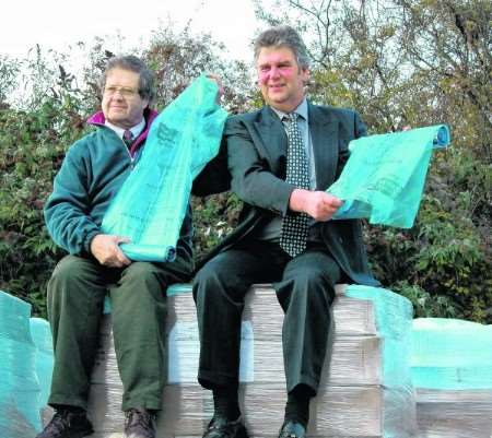 Cllr Filmer (right) and council leader Cllr Rodney Chambers launch a recycling initiative
