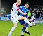 Curtis Weston battles for the ball with Rob Edwards. Picture: Grant Falvey