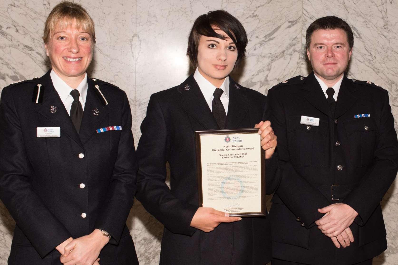 Katherine Delaney (centre) with Assistant Chief Constable Jo Shiner and Chief Superintendent Tim Smith. Picture: Kent Police