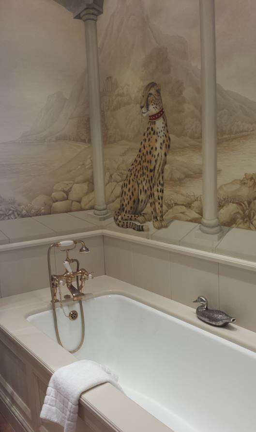 bathroom with leopard mural