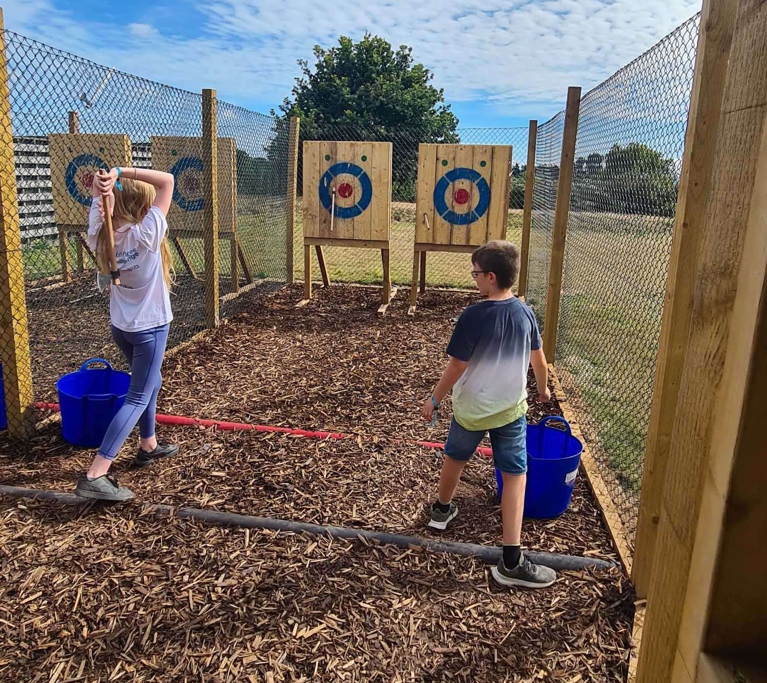 Just two kids throwing axes - nothing to see here