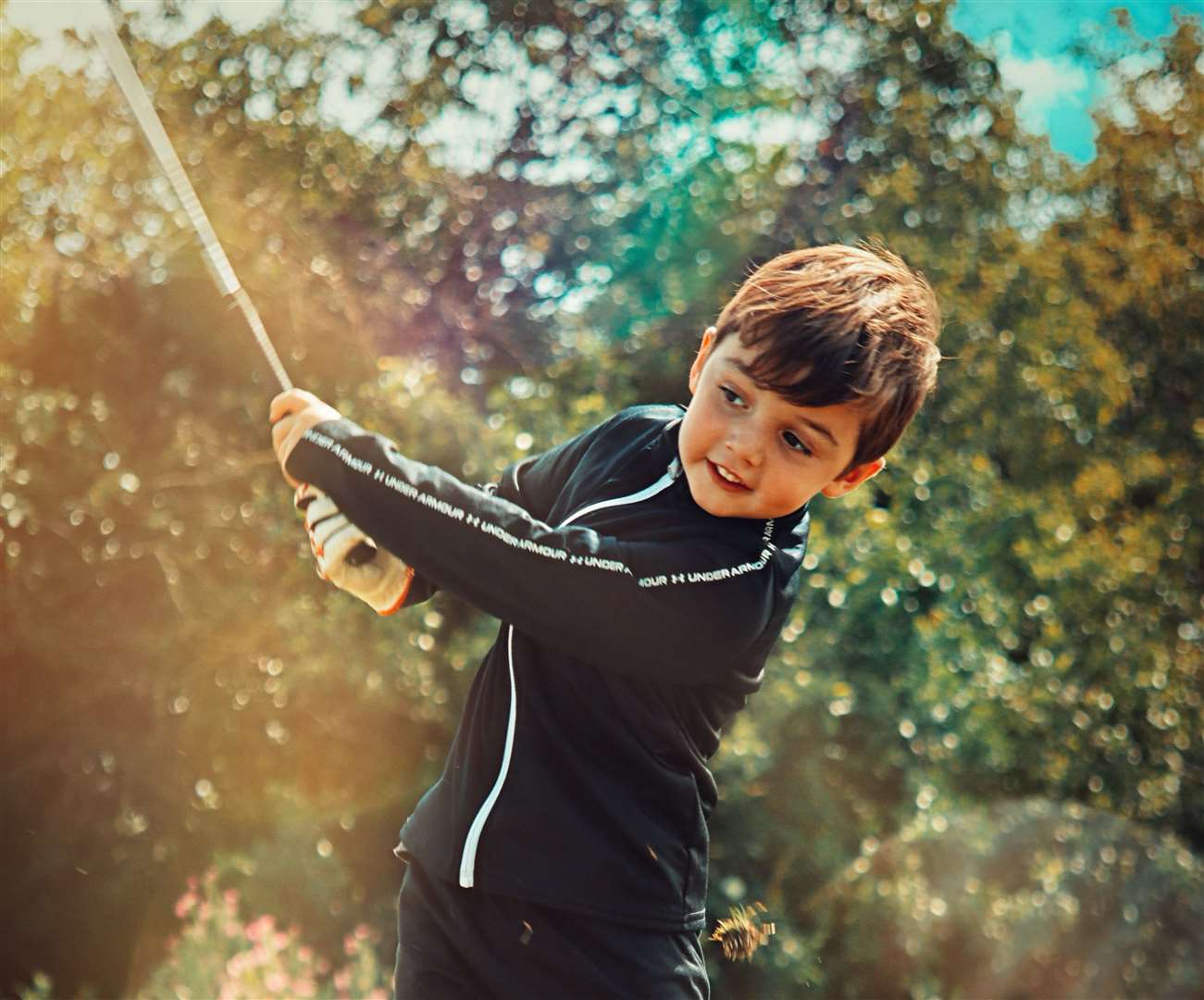 Four-year-old Shane is also a left-handed golfer - something quite rare in the sport