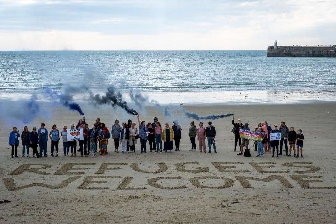 Members of Kent Anti-Racism Network gathered at Sunny Sands beach with a clear message: refugees welcome. Picture credit: Andy Aitchison