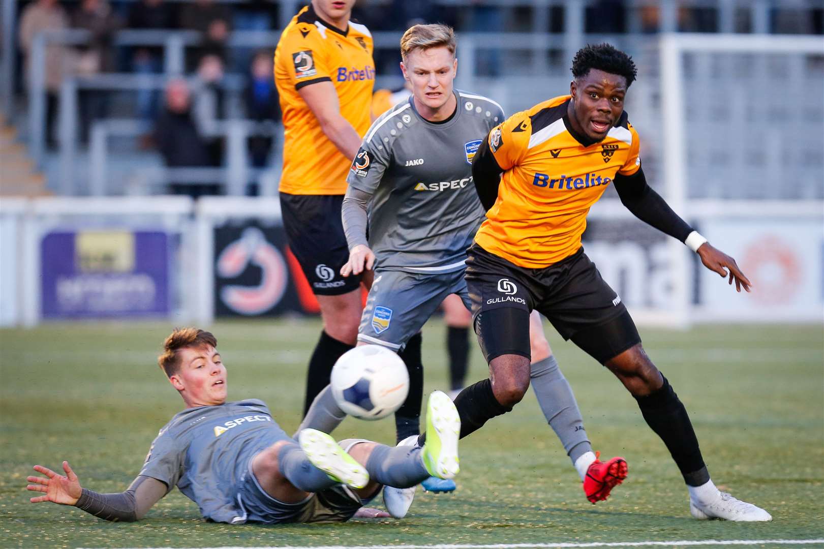 Justin Amaluzor in the thick of the action for Maidstone Picture: Matthew Walker