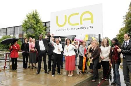 Prof Elaine Thomas, vice-chancellor of the University for the Creative Arts, unveils the new sign at the Canterbury campus watched by Lord Mayor Cllr Carolyn Parry, staff, students and guests. Picture: Chris Davey