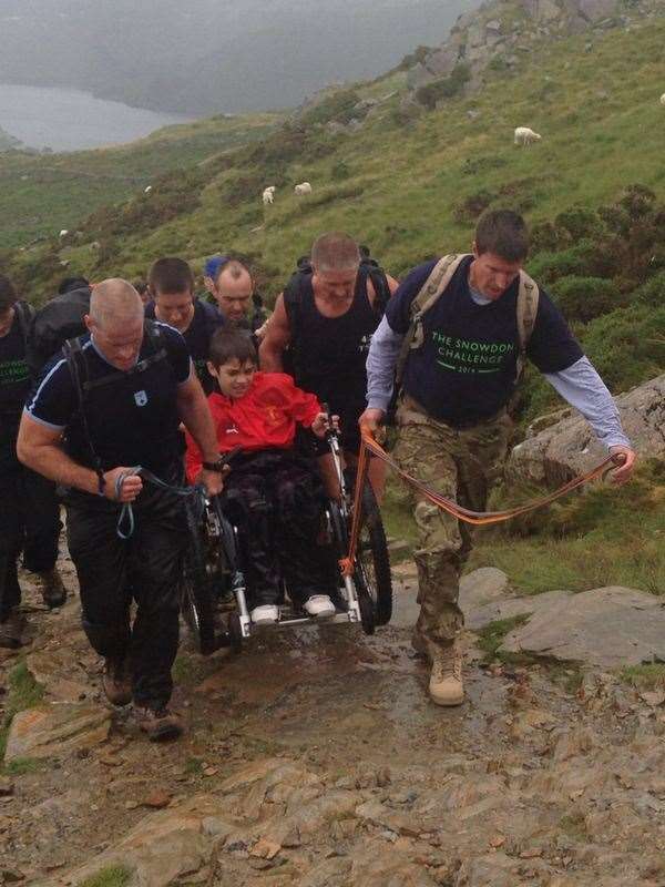 Jake Rafferty ascended Mount Snowdon with family and police officers