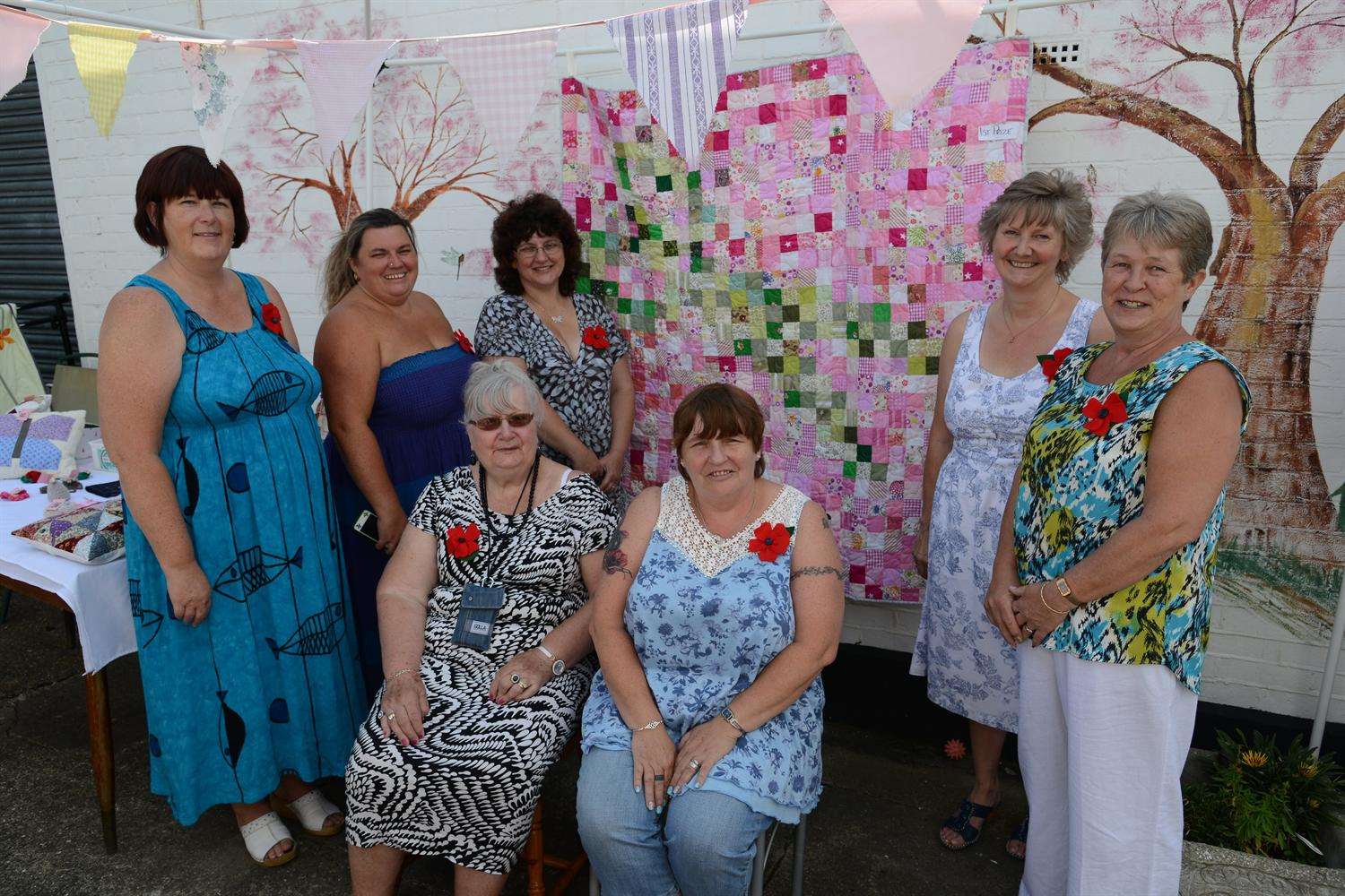 The Poppy Patchers have been fundraising for the Harmony Therapy Trust by raffling a quilt in the charity's colours