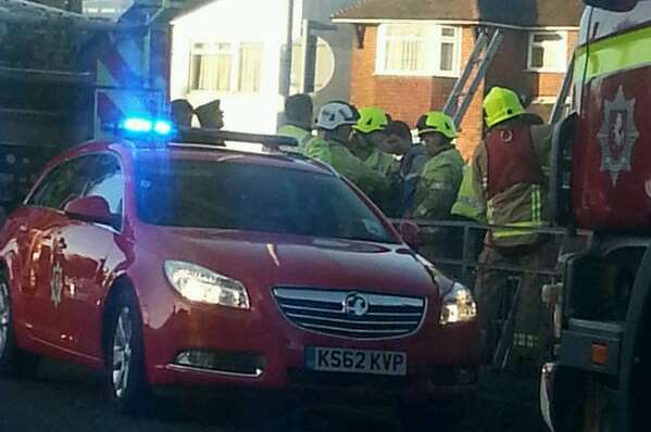 Firefighters at the scene of the boy's fall. Picture: Ben Cooper