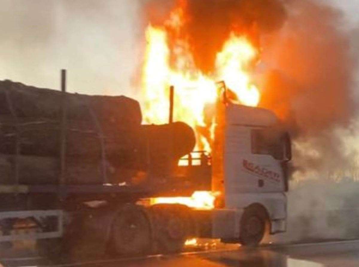 The lorry engulfed in flames on the M25. Picture: UKNIP