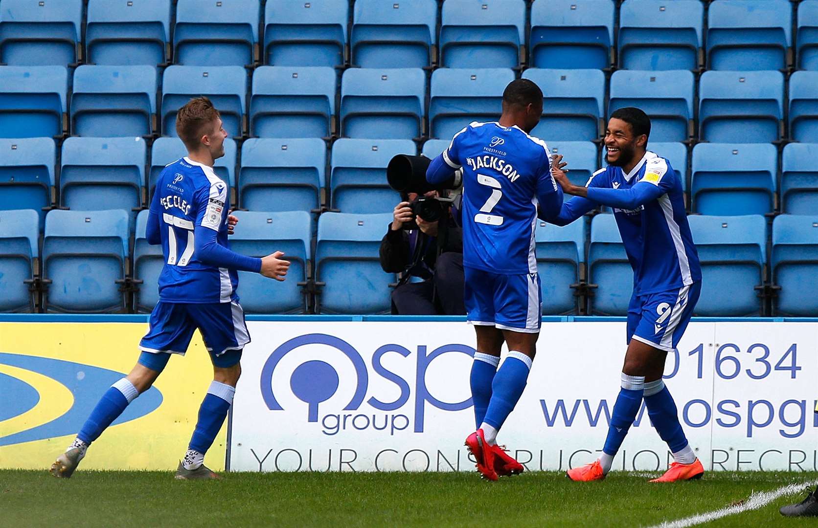 Dominic Samuel is congratulated for his second goal infront of an empty Rainham End Picture: Barry Goodwin