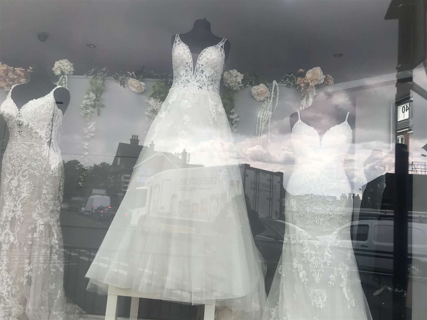 Designer gowns in the window at the Strood bridal shop before it closed