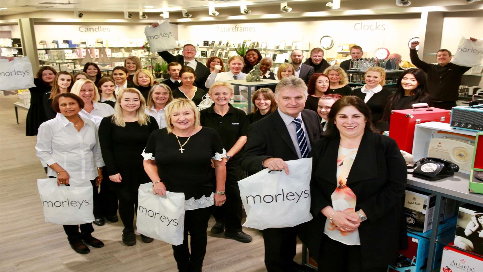 Broadway Shopping Centre general manager Peter Sedge with Morleys Bexleyheath manager Sophie Cassat and staff