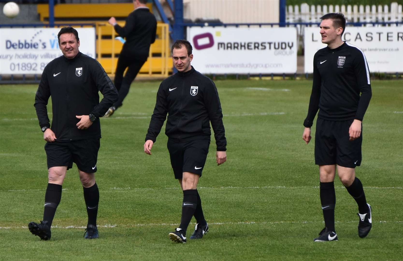 Referee Nick Dunn (centre) has called for change after another weekend of abuse towards officials