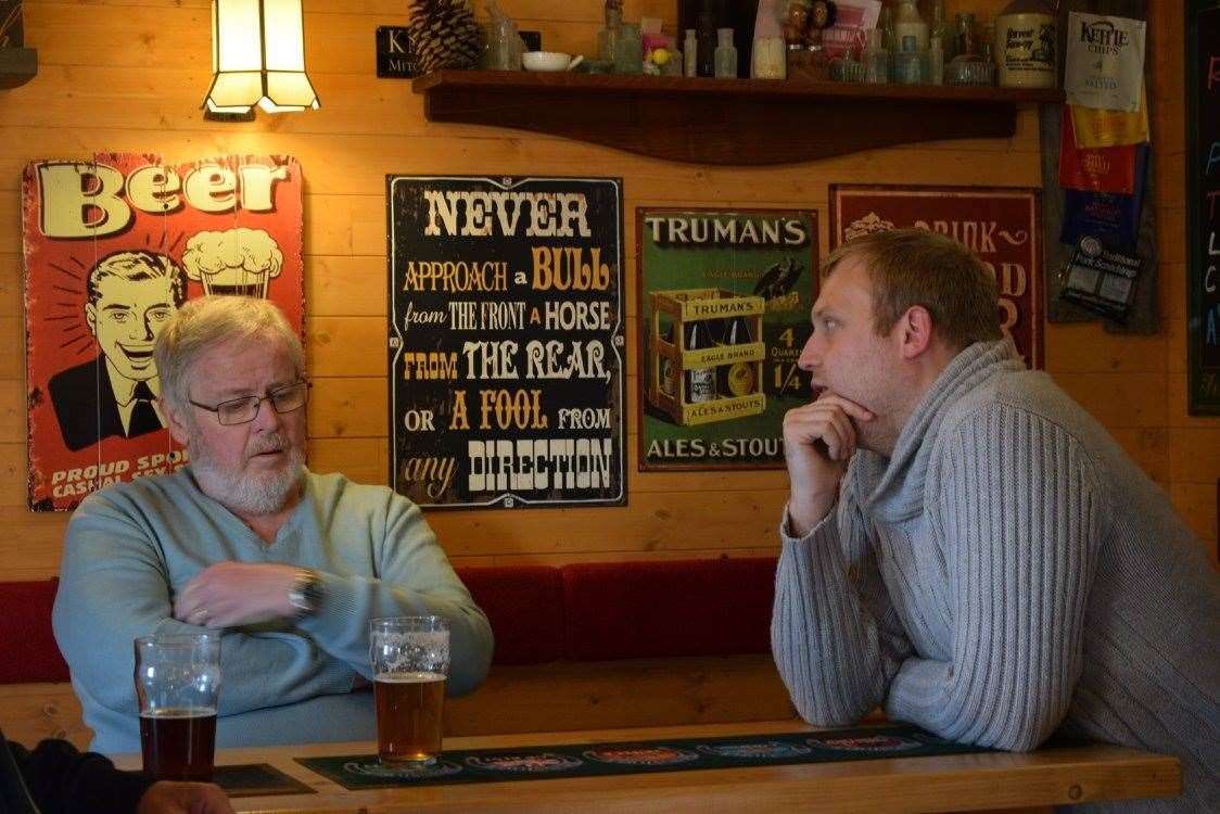 Filmmaker Dan Eycott, who worked on Micropub - The New Local, having a conversation with a local at 10:50 From Victoria micropub in Strood. Picture: Pixelform Studios
