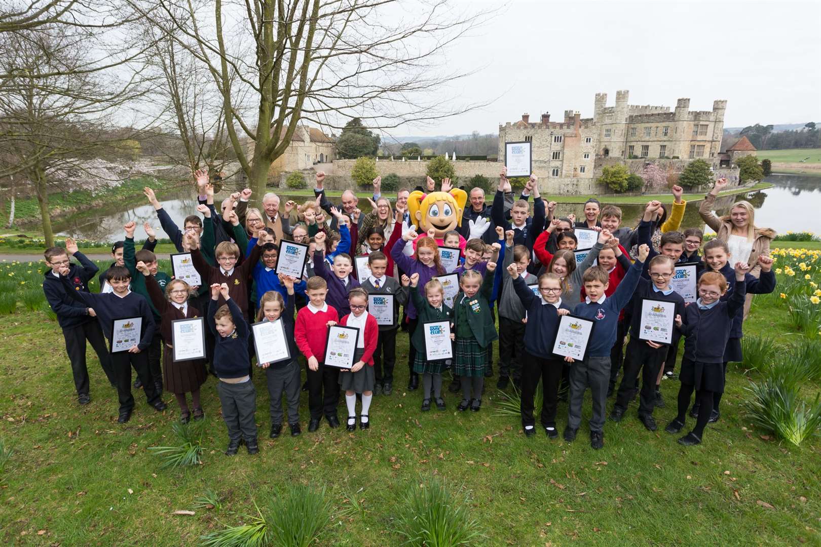 District winners and supporters celebrate walk to school and reading at a prize-giving event at Leeds Castle.