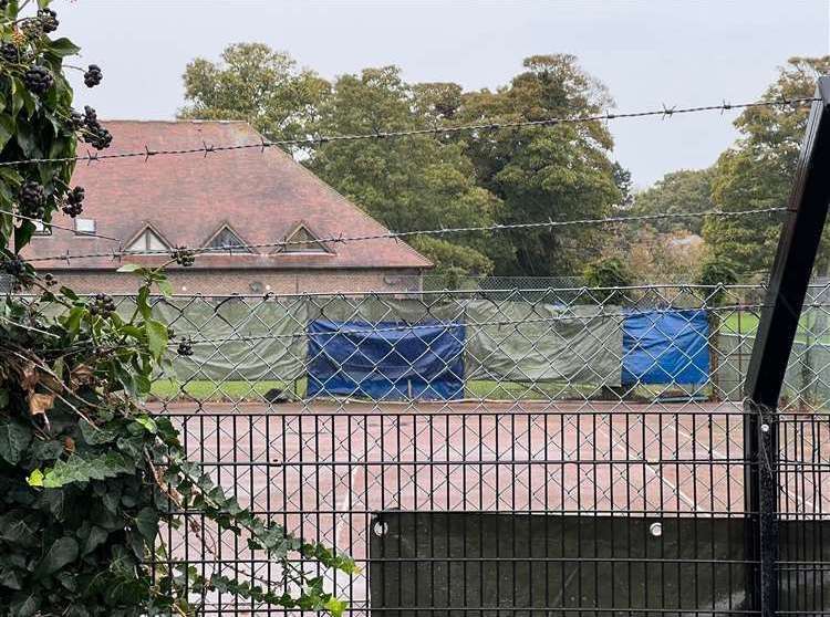 Manston immigration centre - glimpsed from behind the fences