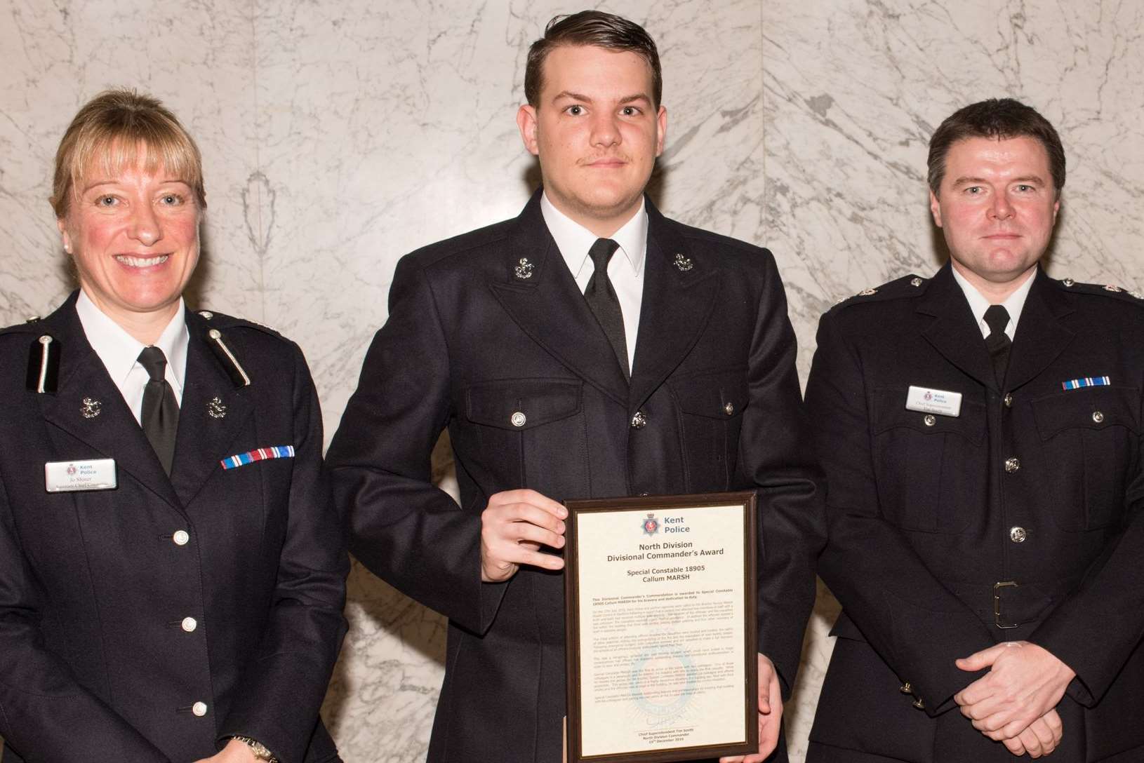 Callum Marsh (centre) with Assistant Chief Constable Jo Shiner and Chief Superintendent Tim Smith. Picture: Kent Police