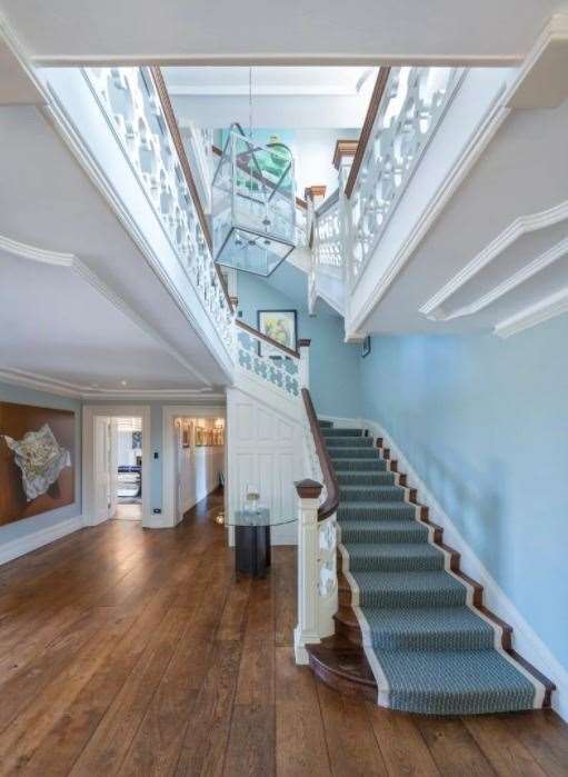 The entrance hall and staircase Picture: Savills