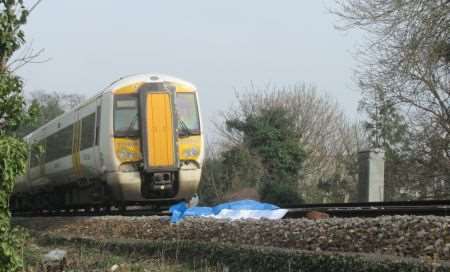 A Ramsgate bound train stops at Glebe Way, Whitstable after a death on the line