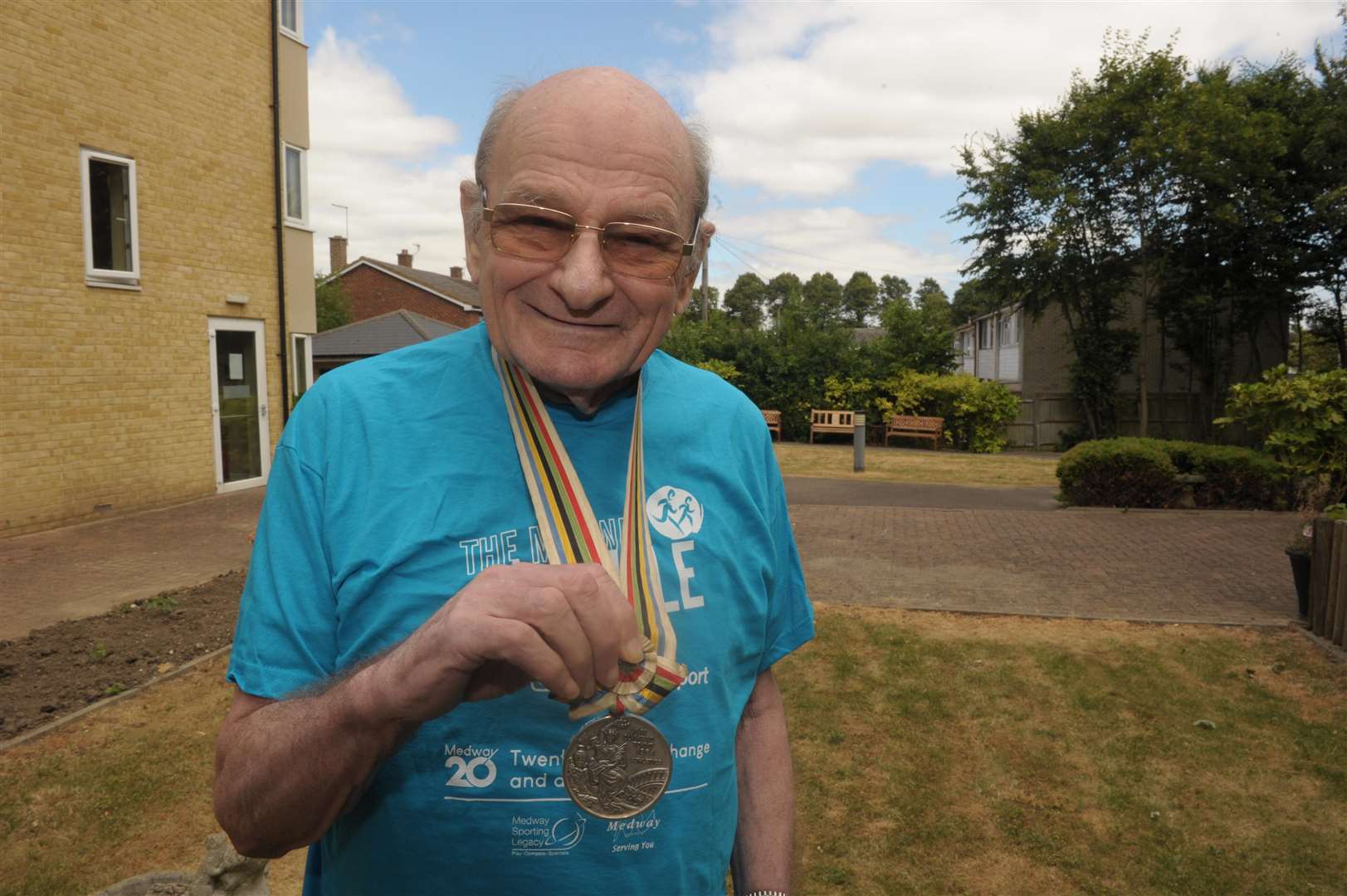 Paul Nihill, former Olympian with his 1964 Tokyo games medal