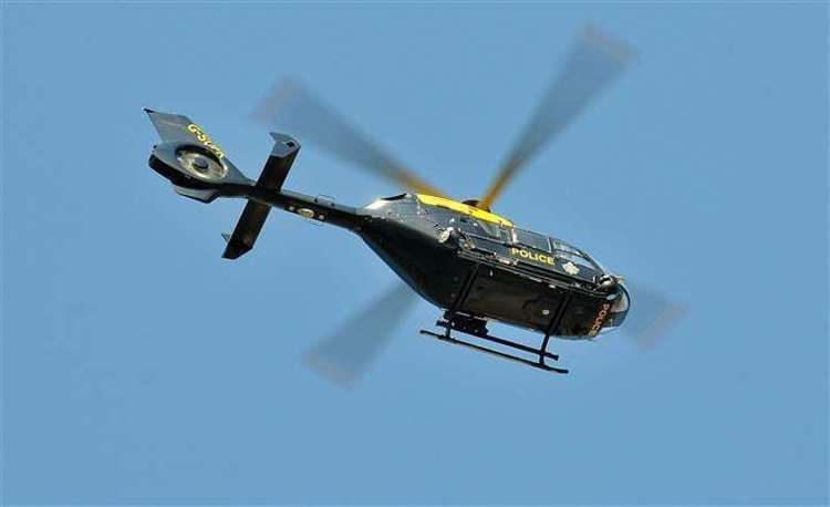 The police helicopter was used in the search. Stock Picture