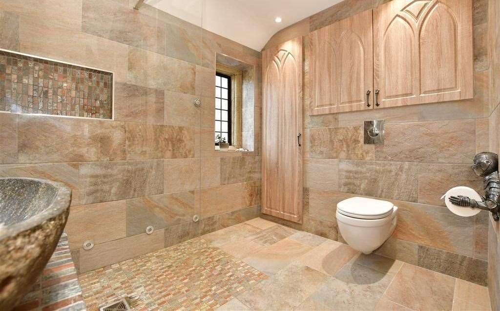 The bathroom has been recently renovated to include a stone basin and underfloor heating. Picture: Fine and Country
