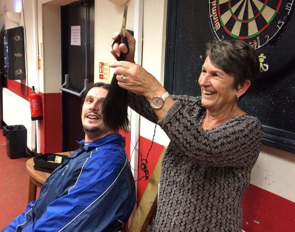 Ross Elderfield having his hair cut off by mum, Jackie Elderfield