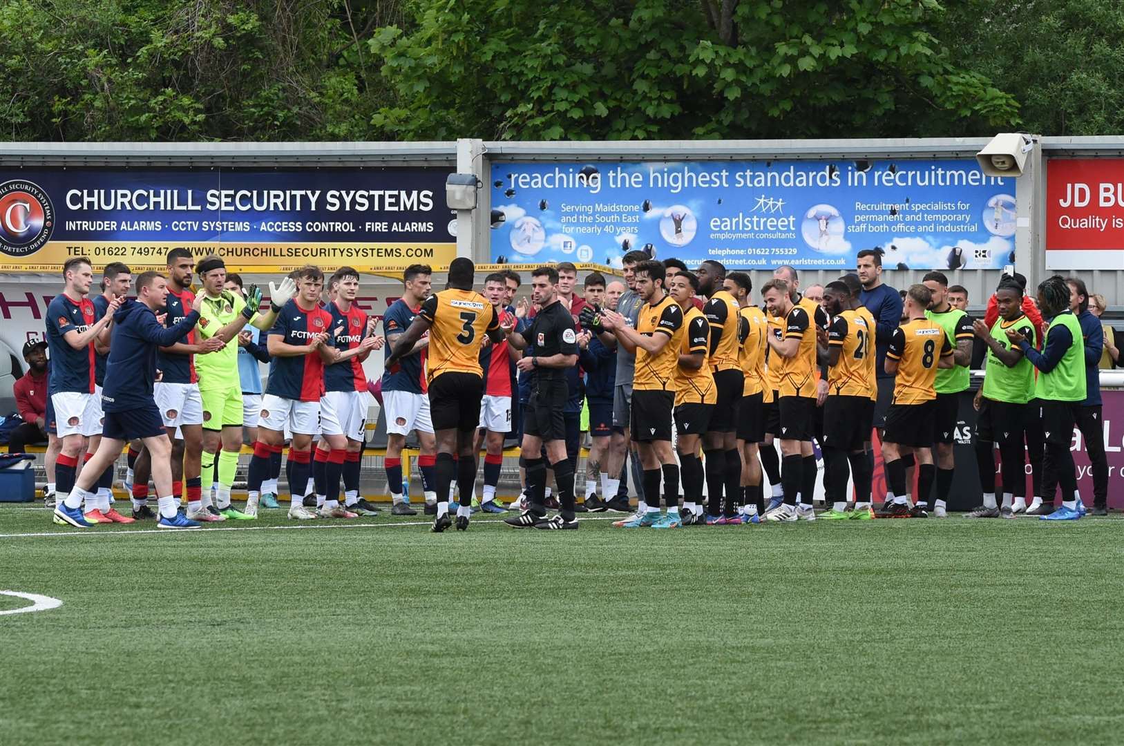 Guard of honour for George Elokobi after being substituted in his final game before retirement Picture: Steve Terrell