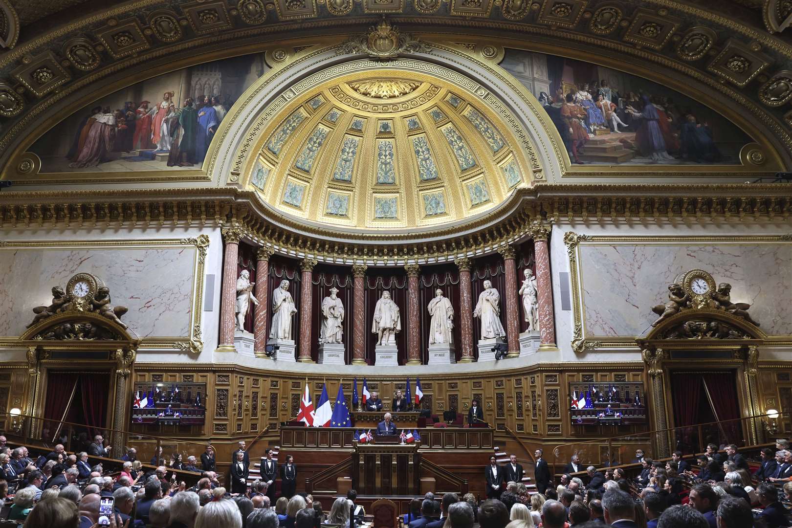The King addresses both the upper and the lower house of parliament at the French Senate in Paris (Emmanuel Dunand, Pool via AP)