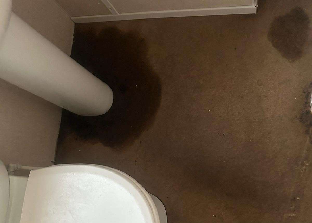 The lino in Tammy's bathroom was removed and damp patches still remain after sewage flooded her home. Picture: Tammy Samuel