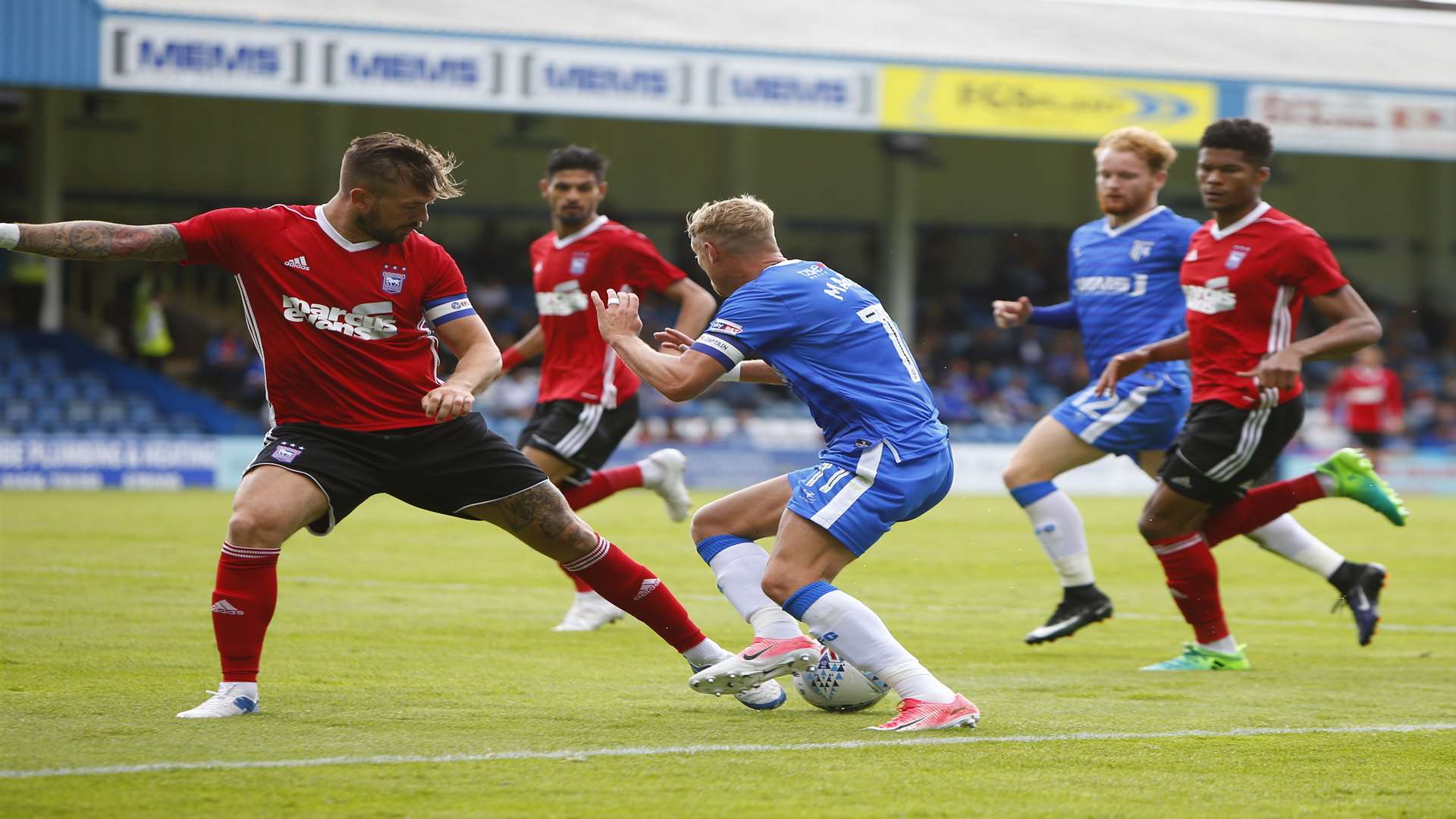 Ipswich captain Luke Chambers trips Lee Martin in the box Picture: Andy Jones