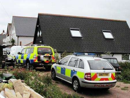 Police outside an address in Faversham Road, Seasalter, near Whistable